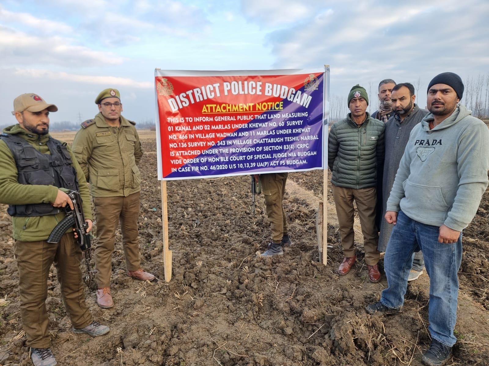 J&K Police at one of the properties attached at the orders of the NIA court | By special arrangement