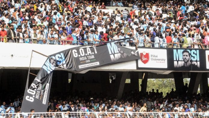 A view of a damaged hoarding of Argentine footballer Lionel Messi's G.O.A.T India Tour 2025 at the Salt Lake Stadium, Kolkata | ANI