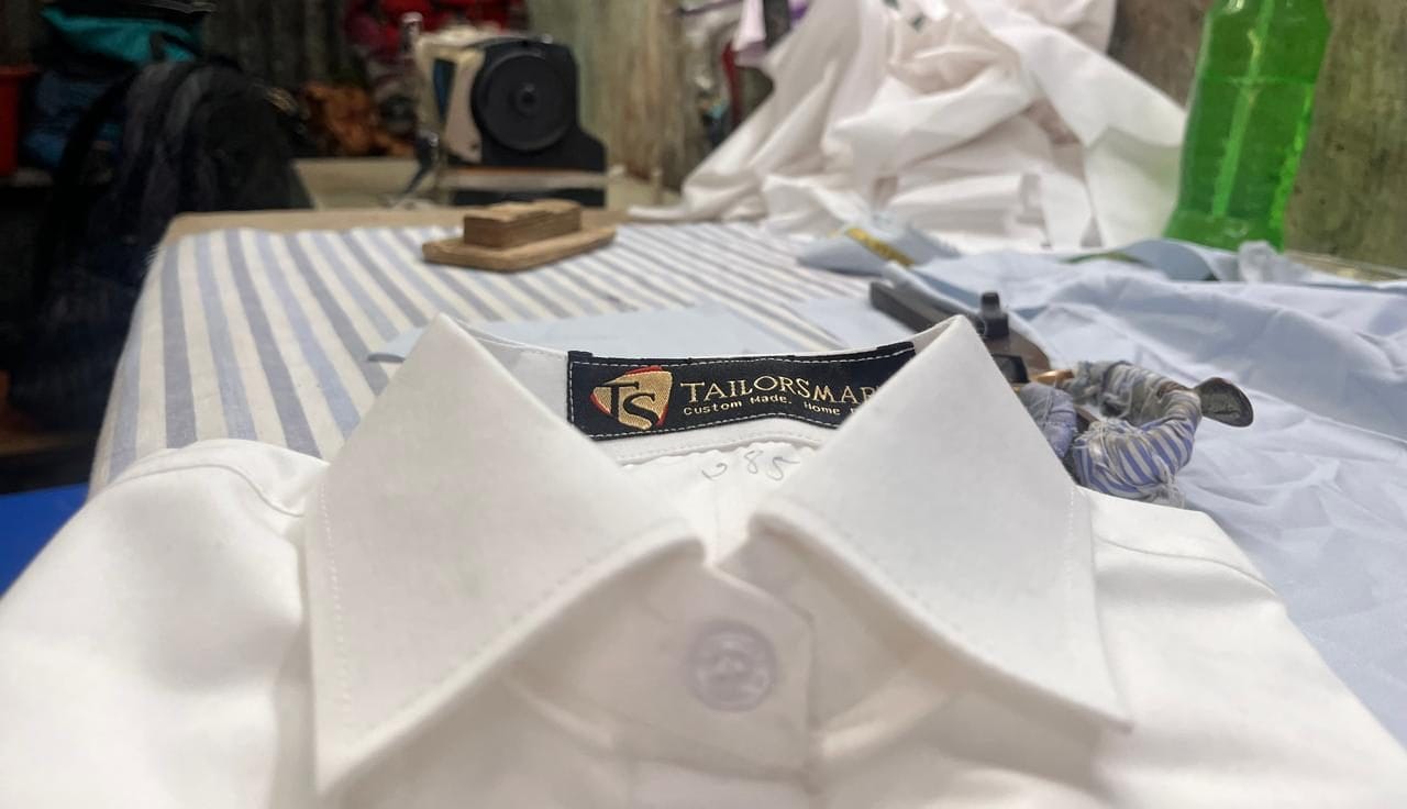 TailorSmart tag on a white shirt in the tailor shop | Photo: Nootan Sharma, ThePrint