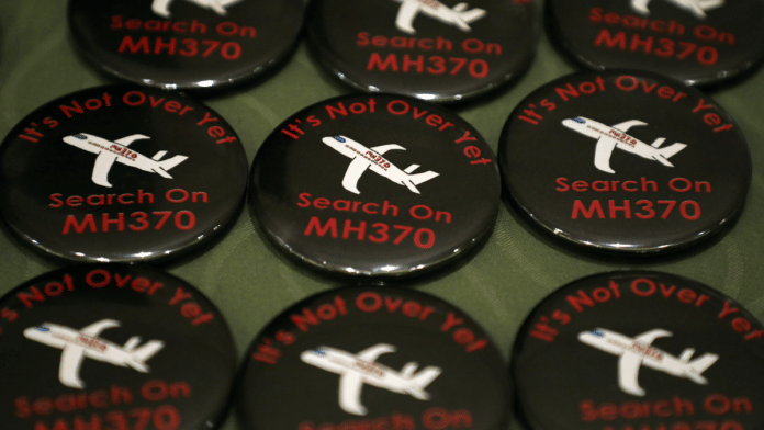File photo | Badges are displayed during the sixth annual remembrance event for the missing Malaysia Airlines flight MH370 in Putrajaya, Malaysia, March 7, 2020 | Reuters