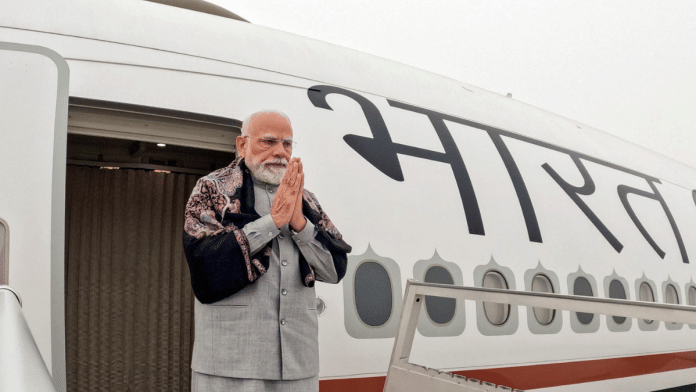 Prime Minister Narendra Modi greets as he emplanes for a three-nation visit to Jordan, Ethiopia and Oman | X/@MEAIndia