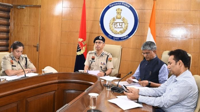 File photo of former Haryana DGP Shatrujeet Singh Kapur (centre) | X@DiproPanchkula