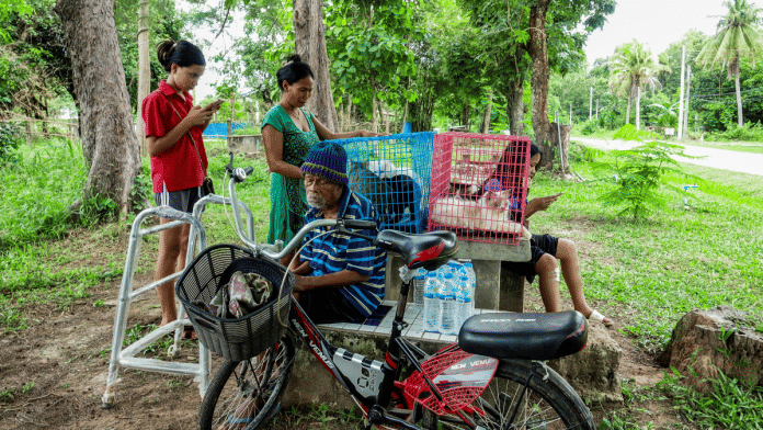 People rest at a shelter amid the clashes between Thailand and Cambodia, in Thailand, July 24, 2025 | Reuters