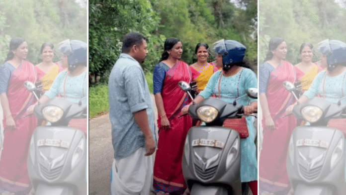 Screengrab showing Kudumbashree worker-turned-ward councillor Ambika Devi (in red saree) reaching out to people in Thiruvananthapuram's Pangode | By Special Arrangement