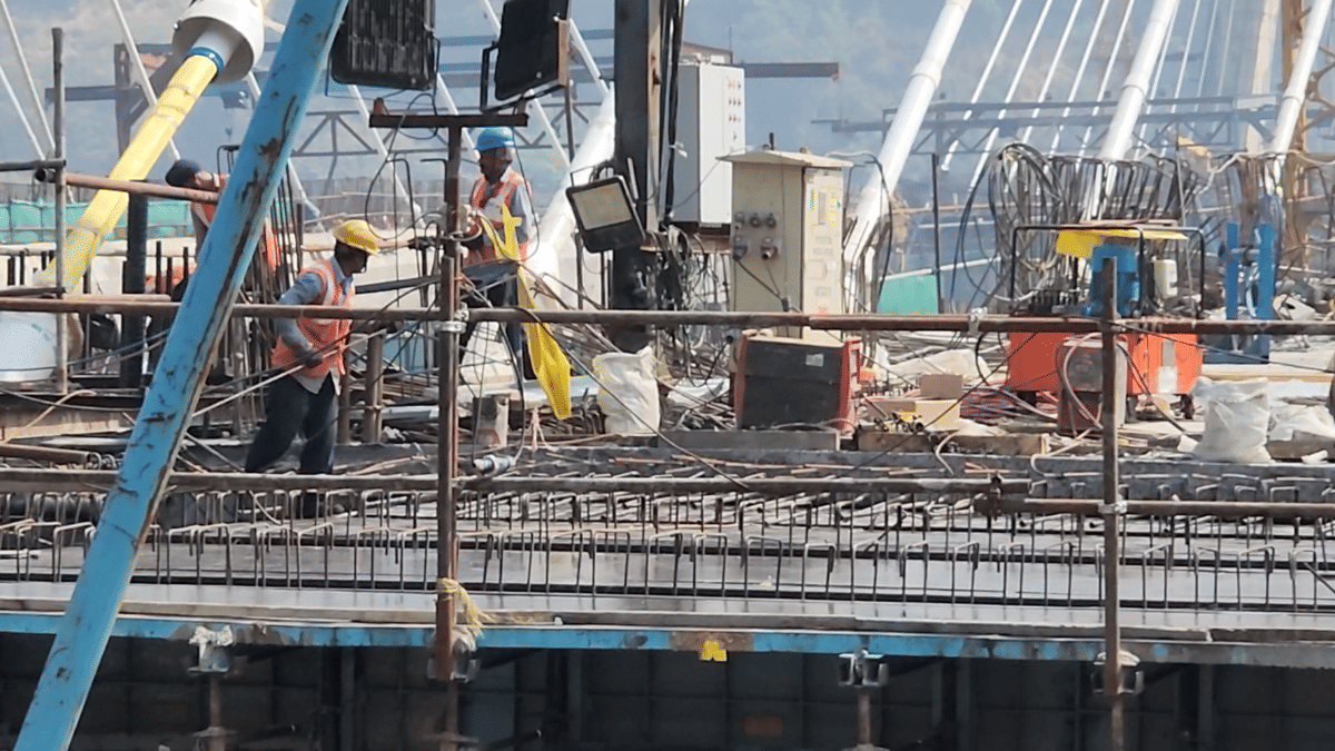 Workers have been busy for years, building the bridge in the green Sahyadri mountains. | Purva Chitnis/ThePrint