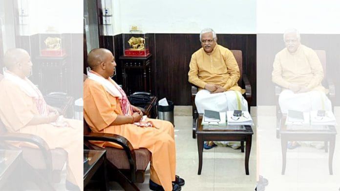 File photo of UP CM Yogi Adityanath (L) with BJP Gen Secy (R) BL Santhosh | ANI