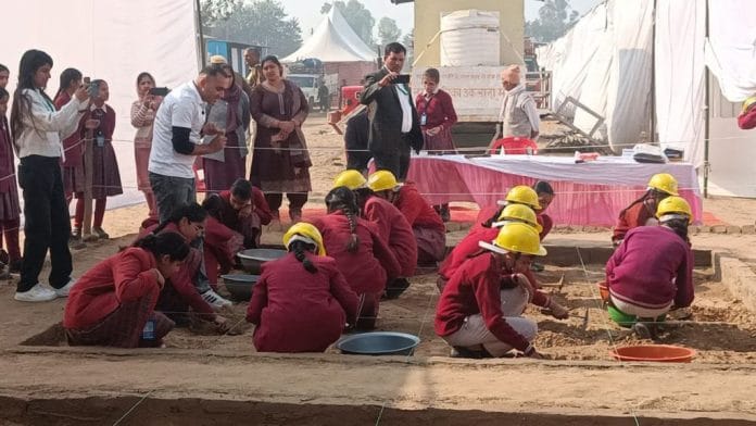 Students at the mock excavation site at Rakhigarhi Festval in Haryana | Photo: Krishan Murari, ThePrint