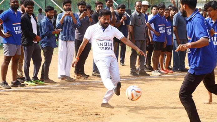File photo of Telangana Chief Minister Revanth Reddy playing football with students at Hyderabad Central University | ANI