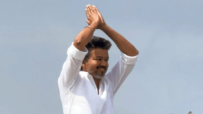 Tamilaga Vettri Kazhagam (TVK) Chief Vijay greets during a public meeting, in Erode on Thursday, 18 December | ANI