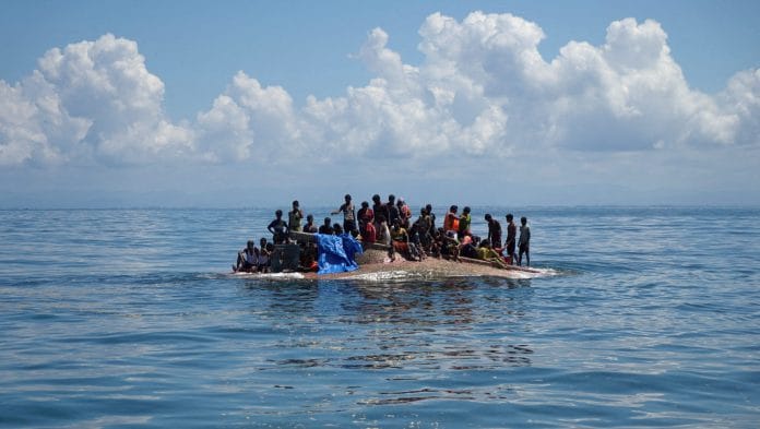 File photo | Rohingya refugees are seen on a capsized boat before being rescued in the waters of West Aceh, Indonesia, March 21, 2024 | Reuters