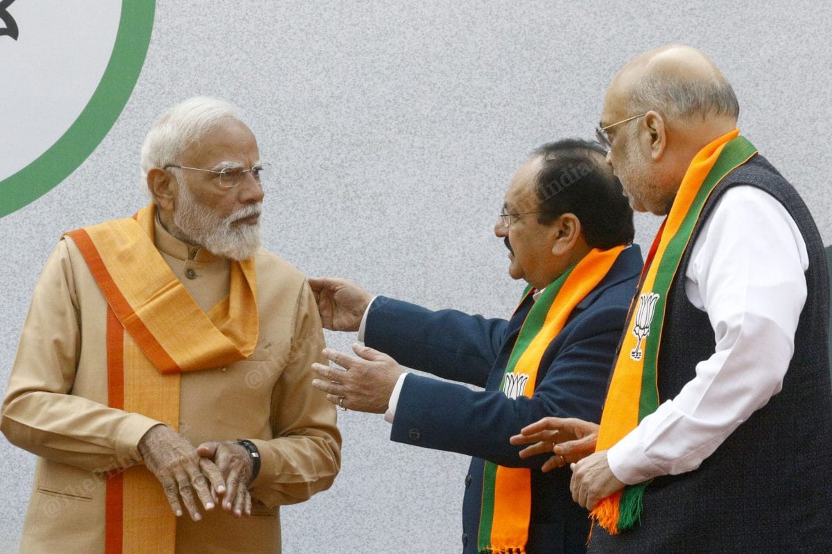 PM Modi, outgoing BJP president J.P. Nadda and Home Minister Amit Shah at party headquarters Tuesday. | Praveen Jain/ThePrint