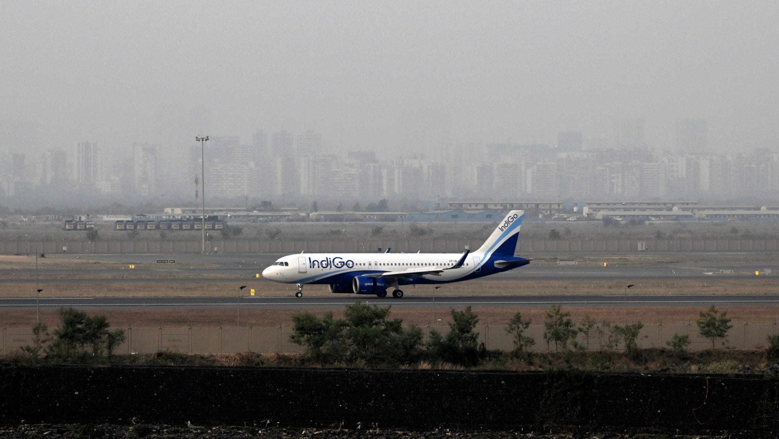 An IndiGo aircraft taxis at the Navi Mumbai Airport in Navi Mumbai | Bloomberg