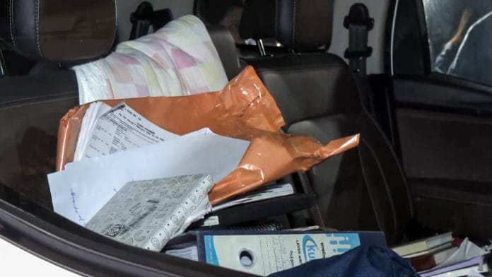 Representational image. | A pile of documents seized following ED raids at office of I-PAC in Kolkata on 8 January. | ANI video grab