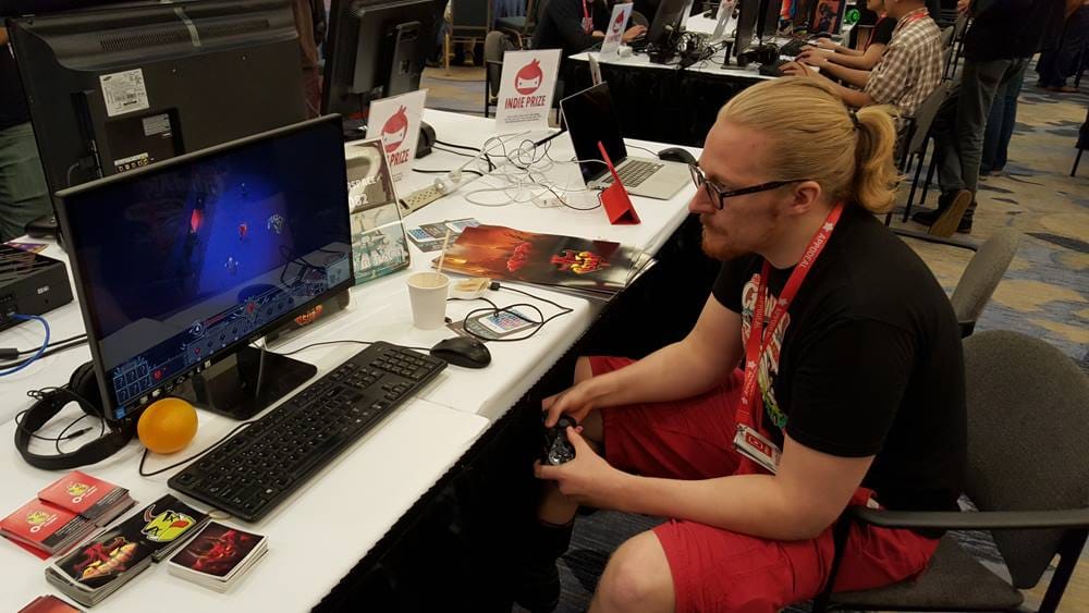 A player tries his hand at Asura at an Indie Games exhibition in the United States. | By special arrangement