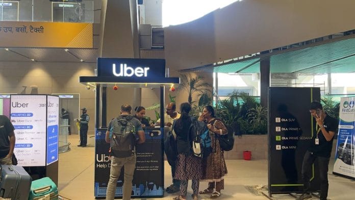 Passengers waiting to get their cabs booked at the uber booth | Kasturi Walimbe | ThePrint