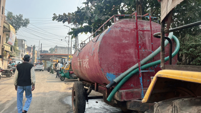 A water tanker is parked at the affected neighbourhood in Indore | Nootan Sharma | ThePrint