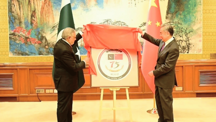 Pakistan Foreign Minister Mohammad Ishaq Dar with his Chinese counterpart Wang Yi jointly unveil the logo marking the 75th anniversary of Pakistan-China diplomatic relations | X/@ForeignOfficePk