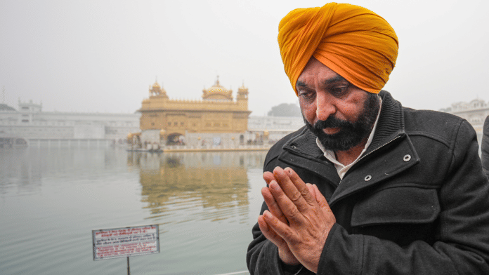 Punjab Chief Minister Bhagwant Mann offers prayers at the Golden Temple before appearing at the Akal Takht Secretariat over allegations of derogatory remarks against Sikh tenets, in Amritsar, on 15 Jan | PTI
