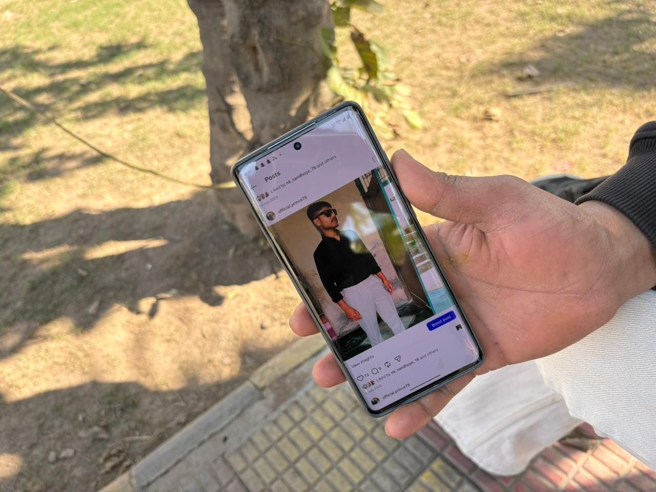 Prince Kashyap shows old photographs from the time he was preparing for the Army | Photo: Sakshi Mehra | ThePrint