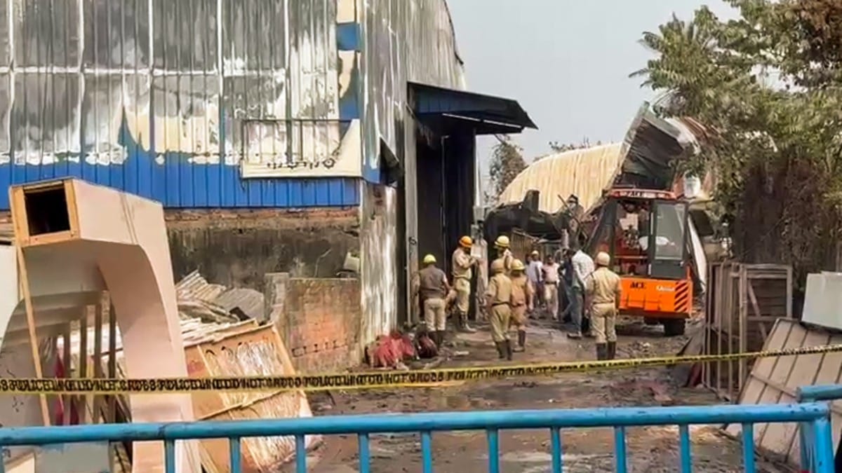 Police personnel at site where fire broke out at a manufacturing unit, in Kolkata, on 27 January 2026 | ANI
