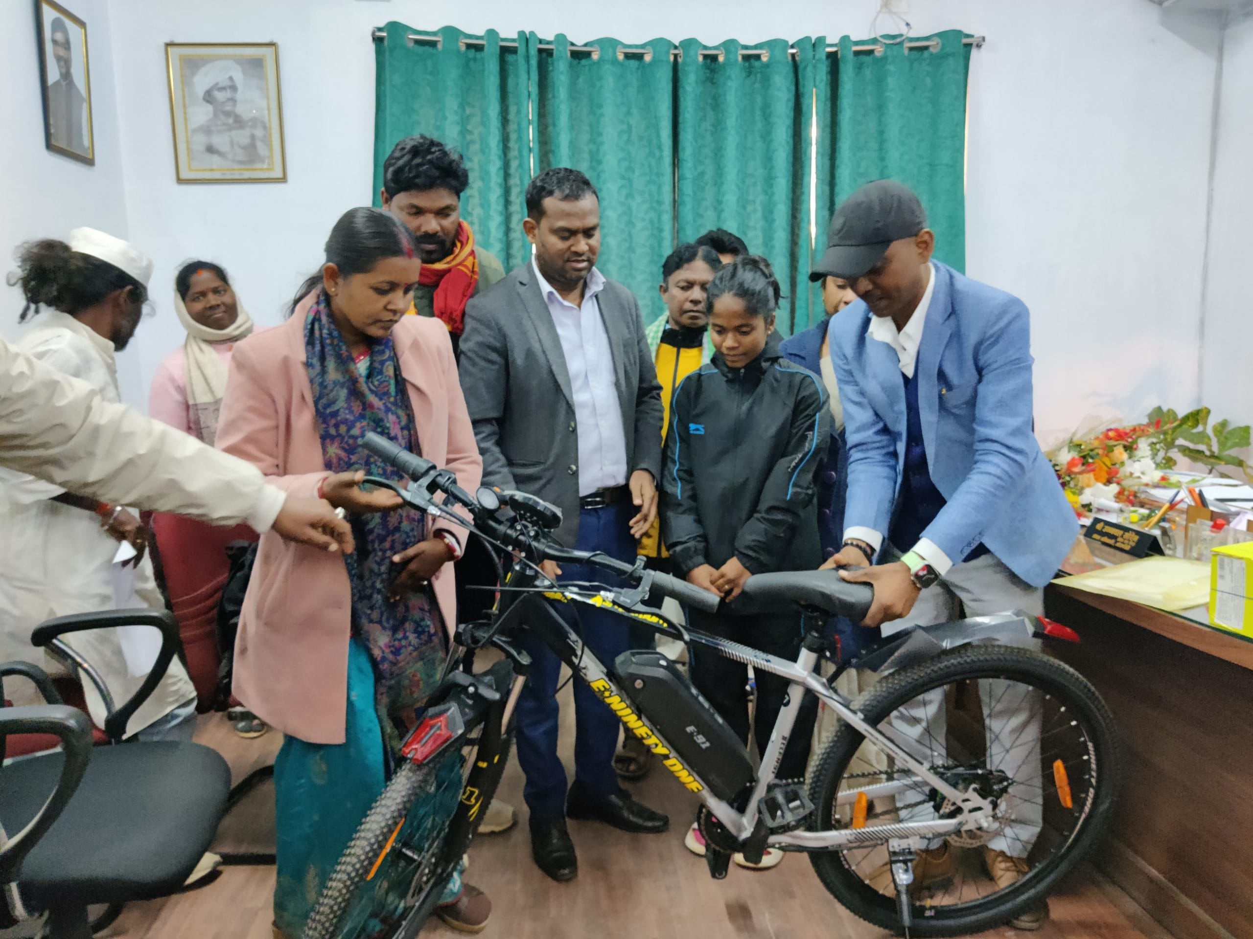 District officials with Anushka Kumari after her national success, as plans are announced for a training ground in her village | Photo: Almina Khatoon | ThePrint