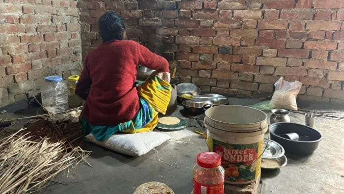 Amrit's mother, Subhavati, preparing breakfast for her children in her newly built kitchen
