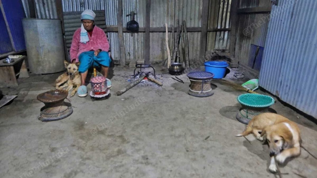 Sorrowful visitors trickle in to meet Chingnu Haokip’s mother Lamkho. Every hug brings her to tears | Photo: Praveen Jain, ThePrint