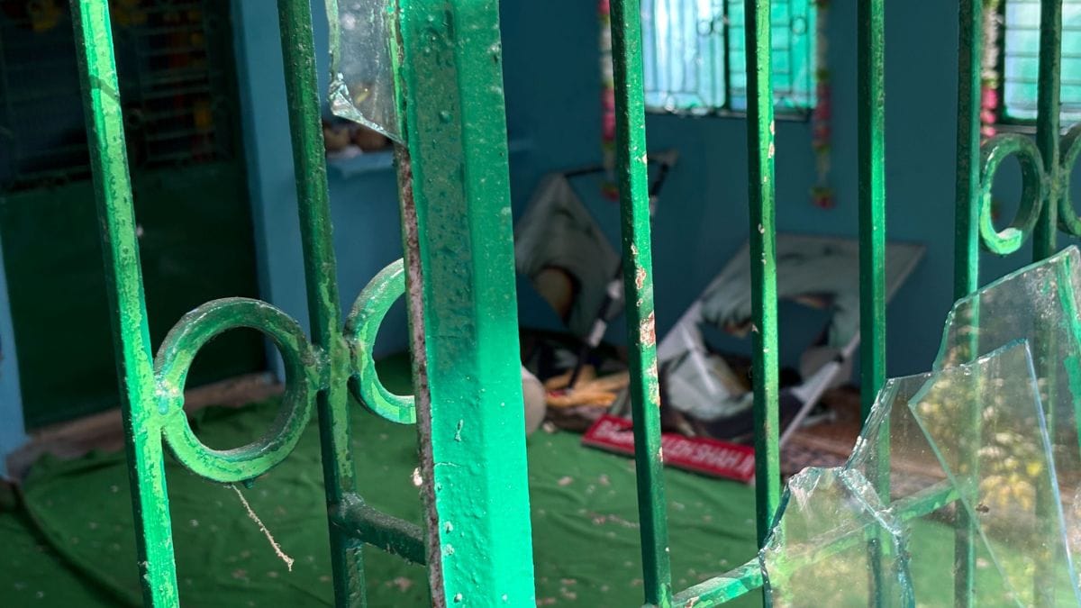 The room where Quran, donation box was kept. Glass shards are littered on the floor | Sakshi Mehra, ThePrint