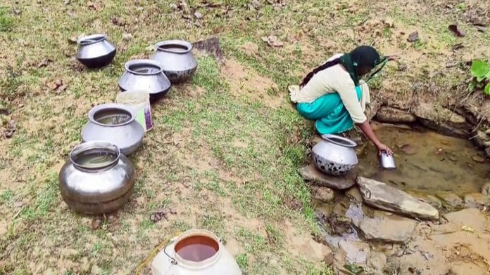 A woman collects drinking water from a small pond in Chhattisgarh | ANI file image for representation
