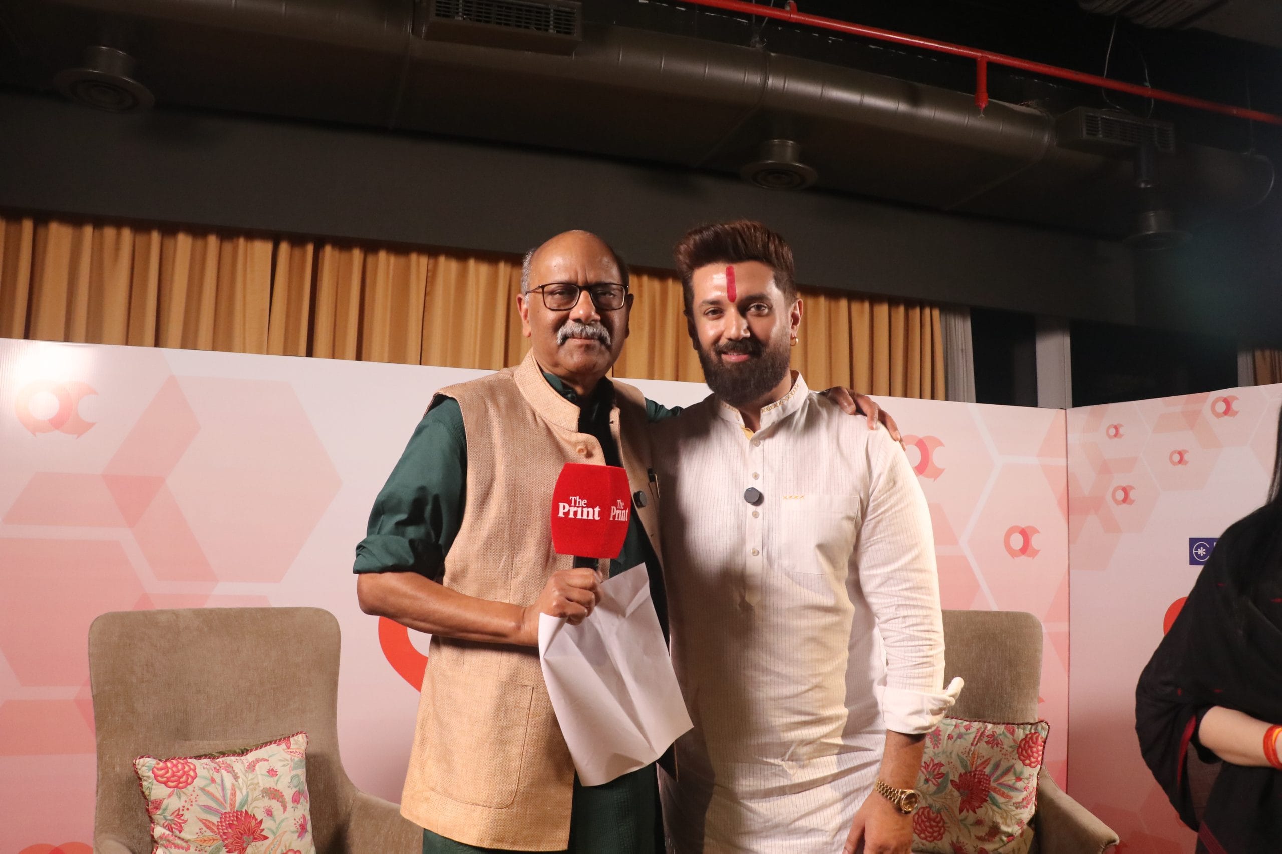 Shekhar Gupta and Chirag Paswan pose for a picture as the evening comes to an end