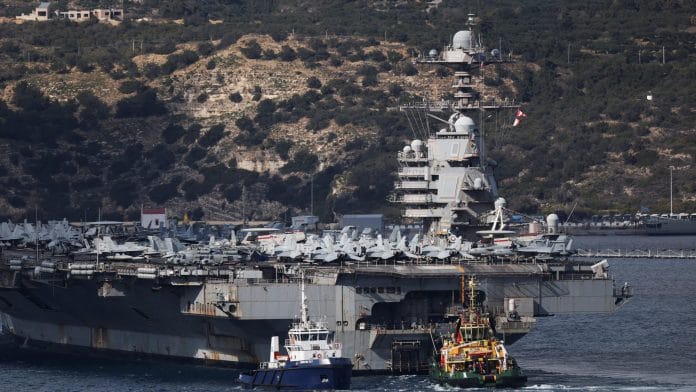 USS Gerald R. Ford aircraft carrier arrives at Souda Bay on the island of Crete, Greece, February 23, 2026. REUTERS/Stelios Misinas