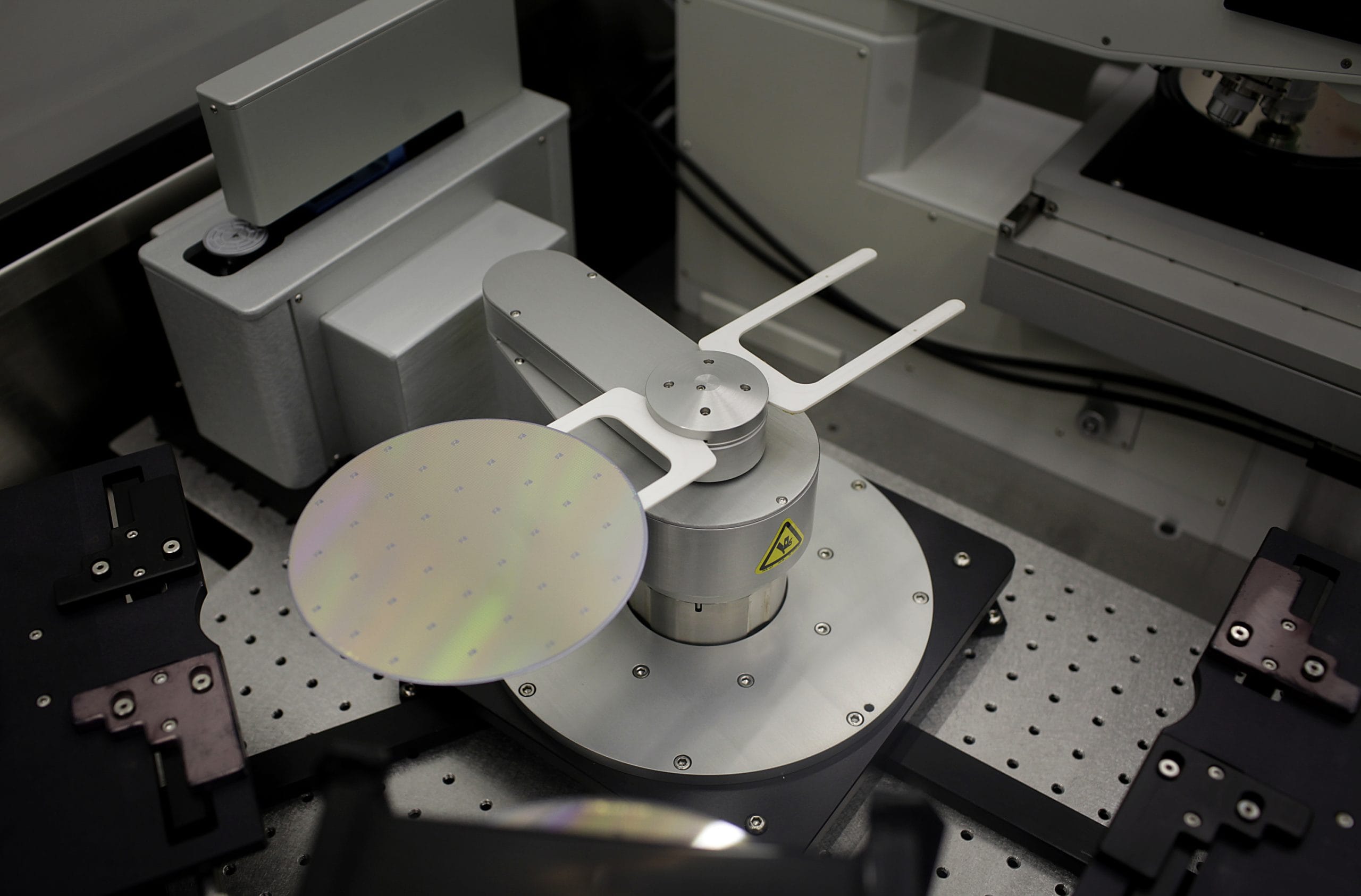 A Gallium Arsenide semiconducting wafer is processed into chips for radio frequency communications devices at RF Micro Devices Inc. (RFMD) headquarters in Greensboro, North Carolina, U.S., on Wednesday, Feb. 15, 2012. RF Micro Devices Inc. manufactures radio-frequency components and semiconductor technologies. Photographer: Victor J. Blue/Bloomberg