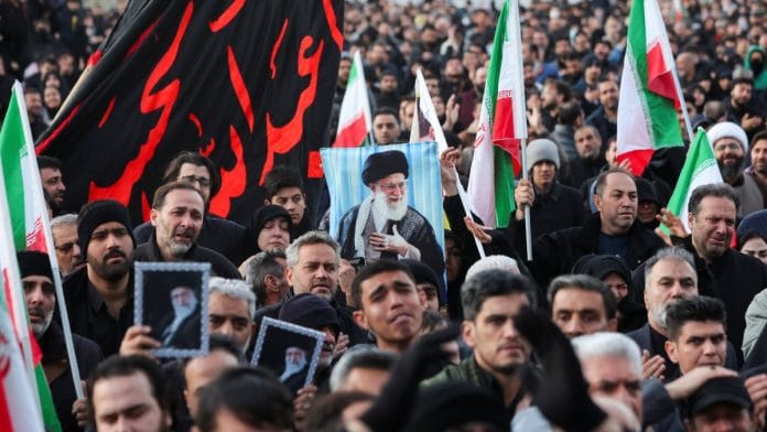 People gather at Enghelab Square in Tehran on 1 March 2026 after confirmation of the killing of Iran’s Supreme Leader Ayatollah Ali Khamenei in Israeli and U.S. strikes | Majid Asgaripour/WANA via REUTERS