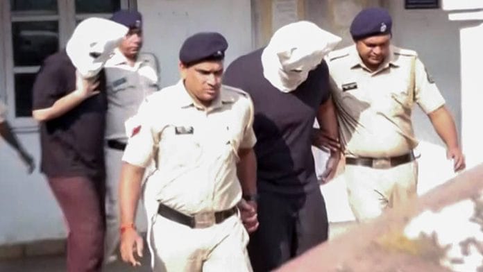 Luthra brothers Saurabh and Gaurav in police custody in December 2025 | ANI video grab