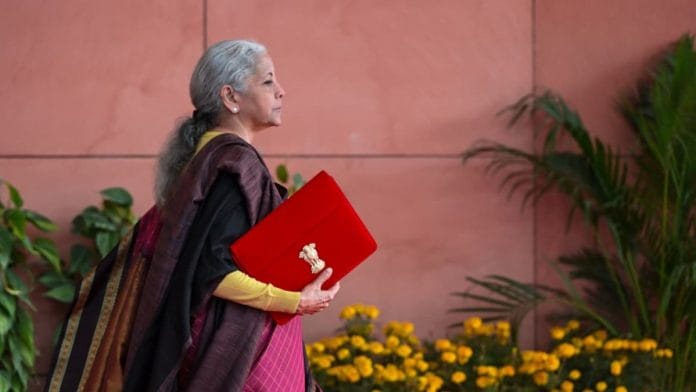 Union Finance Minister Nirmala Sitharaman, with Minister of State Pankaj Chaudhary and other senior officers, outside the Finance Ministry ahead of the presentation of Union Budget 2026-27 at Ministry of Finance, Kartavya Bhavan in New Delhi Sunday | Suraj Singh Bisht | ThePrint