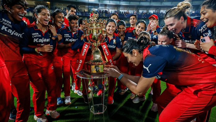 RCB cricketers right before getting their hands on WPL trophy for the second time after they trounced Delhi Capitals by six wickets in the final match | X/@RCBTweets