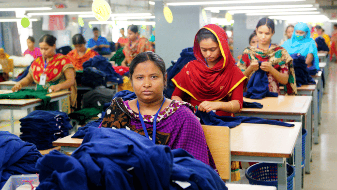 Garment workers during a shift in a clothing plant in Bangladesh | Flickr