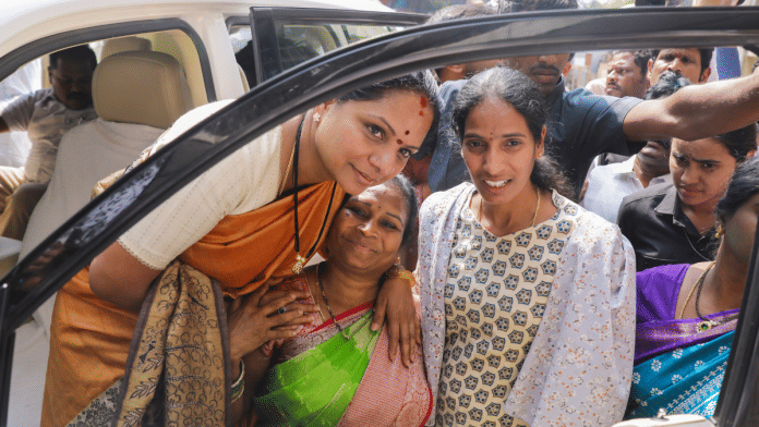 Telangana Jagruthi president K Kavitha (left) is greeted by a supporter in Hyderabad after a Delhi court discharged her in liquor policy case | PTI