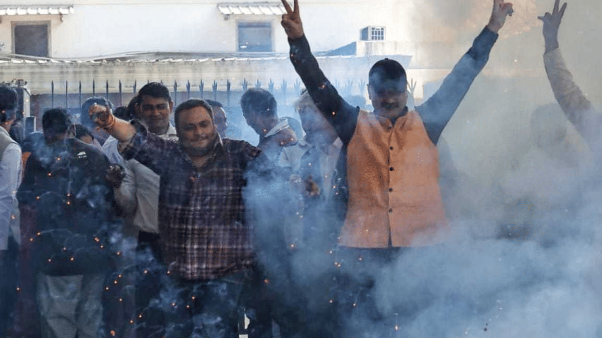 AAP supporters celebrate the court order. | Praveen Jain/ThePrint