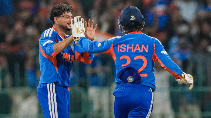India's Kuldeep Yadav celebrates with Ishan Kishan after taking the wicket of Pakistan's Mohammad Nawaz during the ICC Men's T20 World Cup 2026 match at R Premadasa Stadium in Colombo, Sri Lanka | PTI