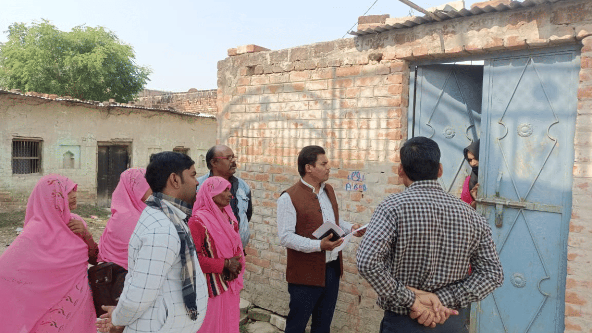 CM Fellow Rajesh Kumar, joined by some teachers, persuade parents to send their children to schools. | By special arrangement