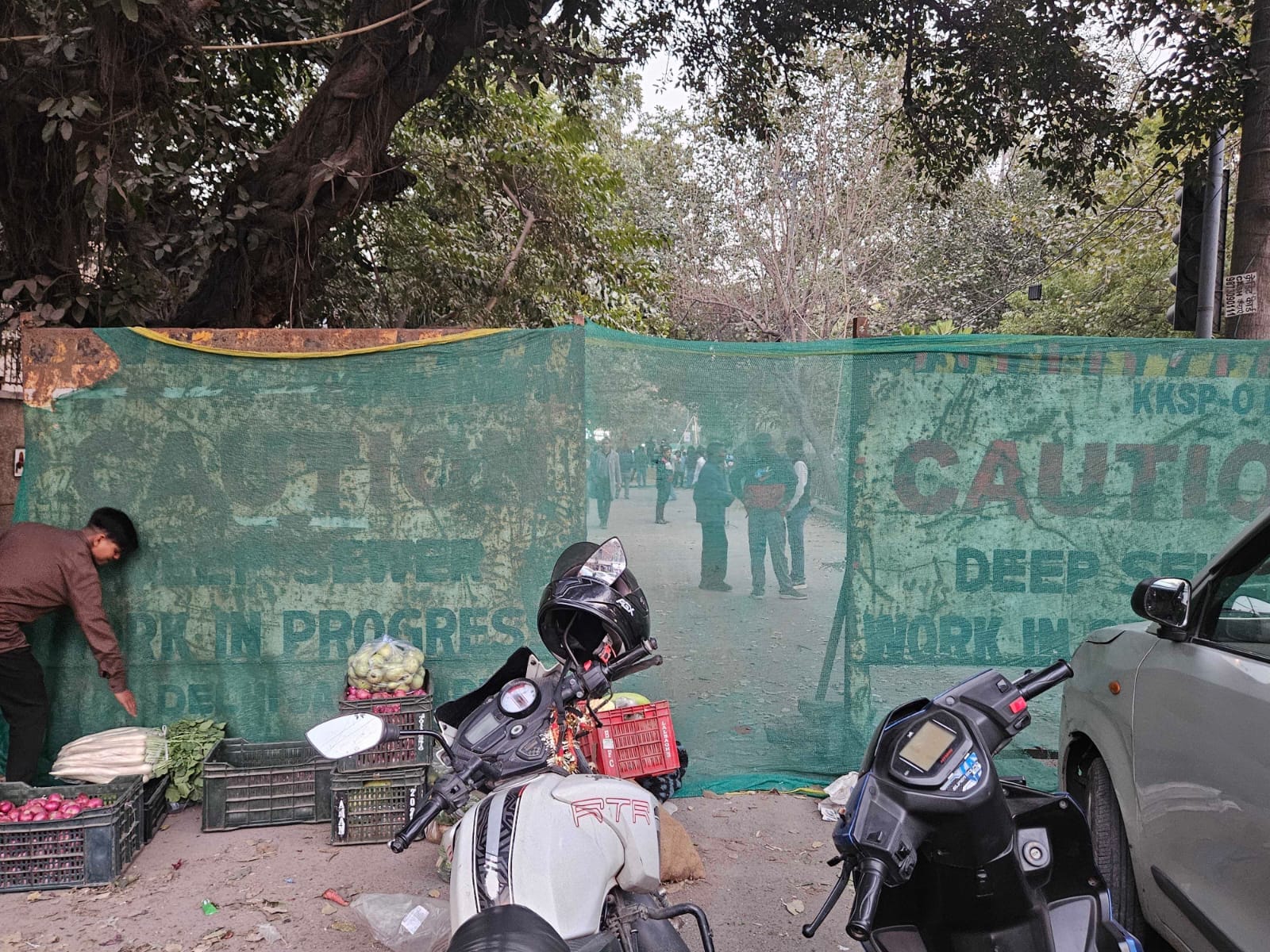 A vegetable seller near the accident site. Locals say they heard no sound of anyone falling | VidhIi Bhutra | ThePrint 