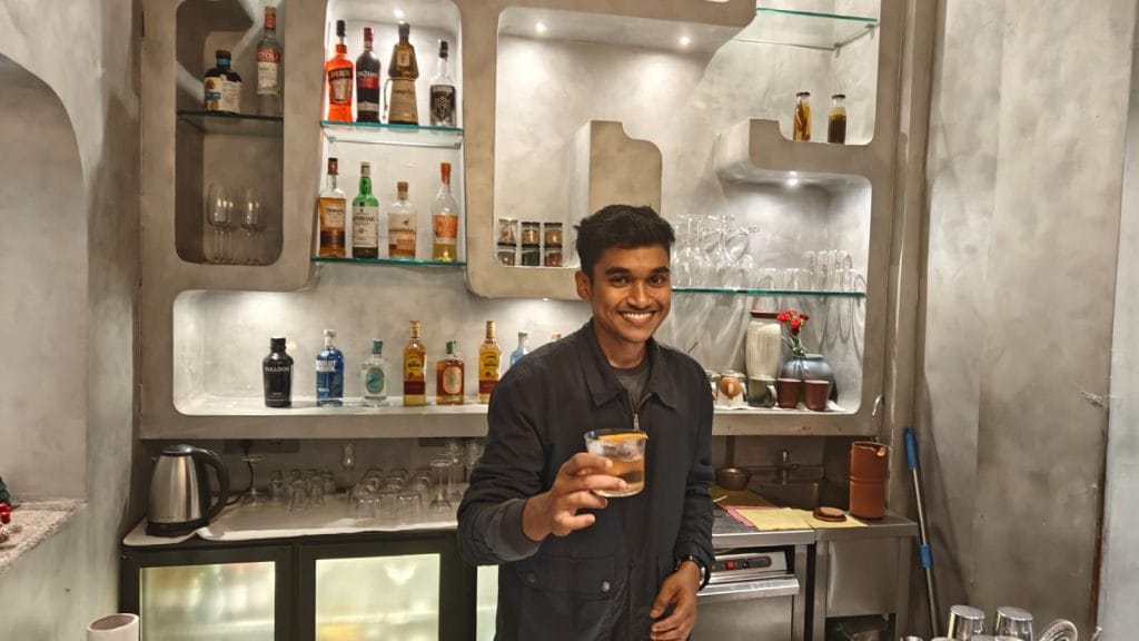 Manan Sen is the bartender of Sienna's newest bar space where he whips up cocktails inspired by the bazaar to table concept. Tina Das | ThePrint
