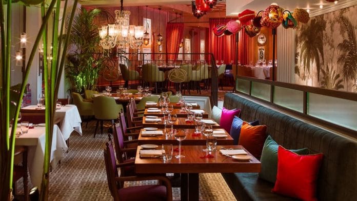 The 100-year-old establishment is awash with vibrant colours | Source: Veeraswamy