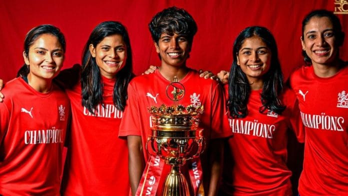 RCB players pose with the WPL trophy | Representational image | Instagram