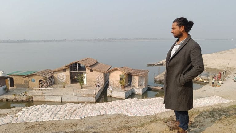 A floating house has withstood floods in Bihar for 3 years. The engineer wants to scale up