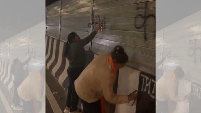 In the now-viral video, two women can be heard chanting “Jai Shri Ram” after spraying the paint on public infrastructure near the Saharanpur district border | Photo: X