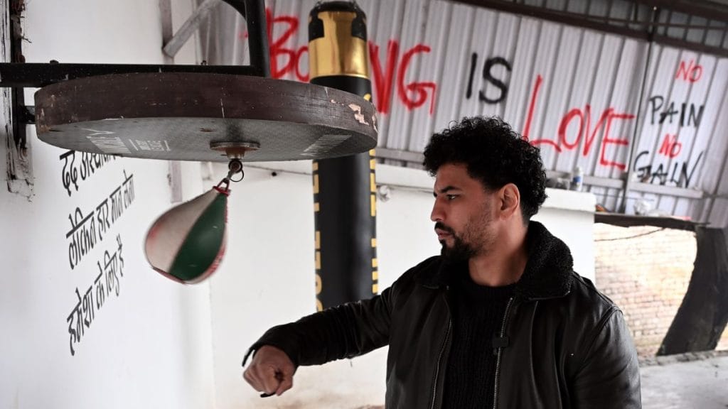 Neeraj Goyat training with a punching bag. Suraj Singh Bisht | ThePrint
