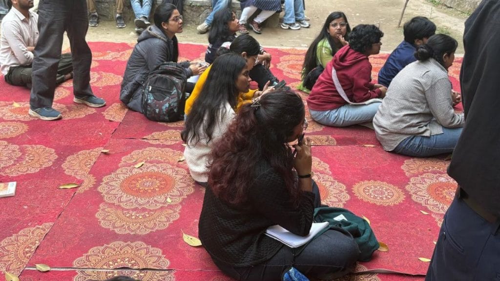 Students sitting for an open air lecture | Sakshi Mehra, ThePrint