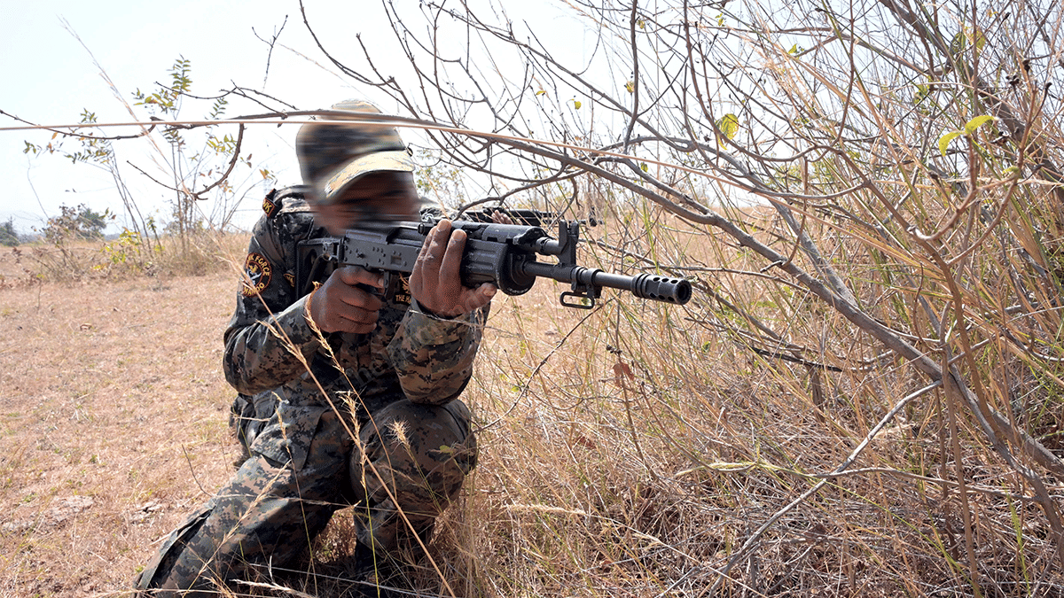 A Hawk personnel keeps an eye on the jungle | Suraj Singh Bisht | ThePrint